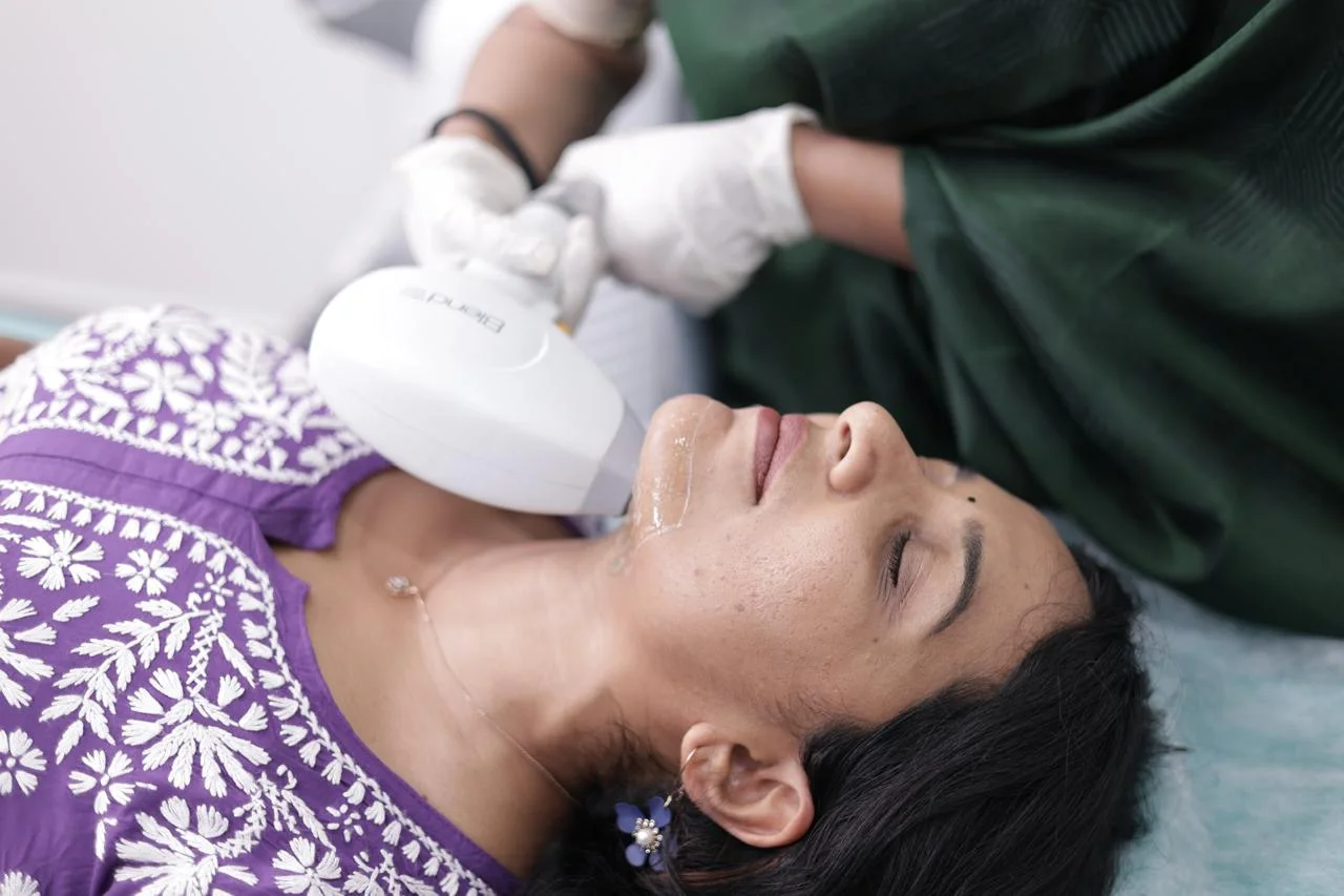 Dermatologist performing laser hair removal treatment at DermaVue Thiruvananthapuram clinic
