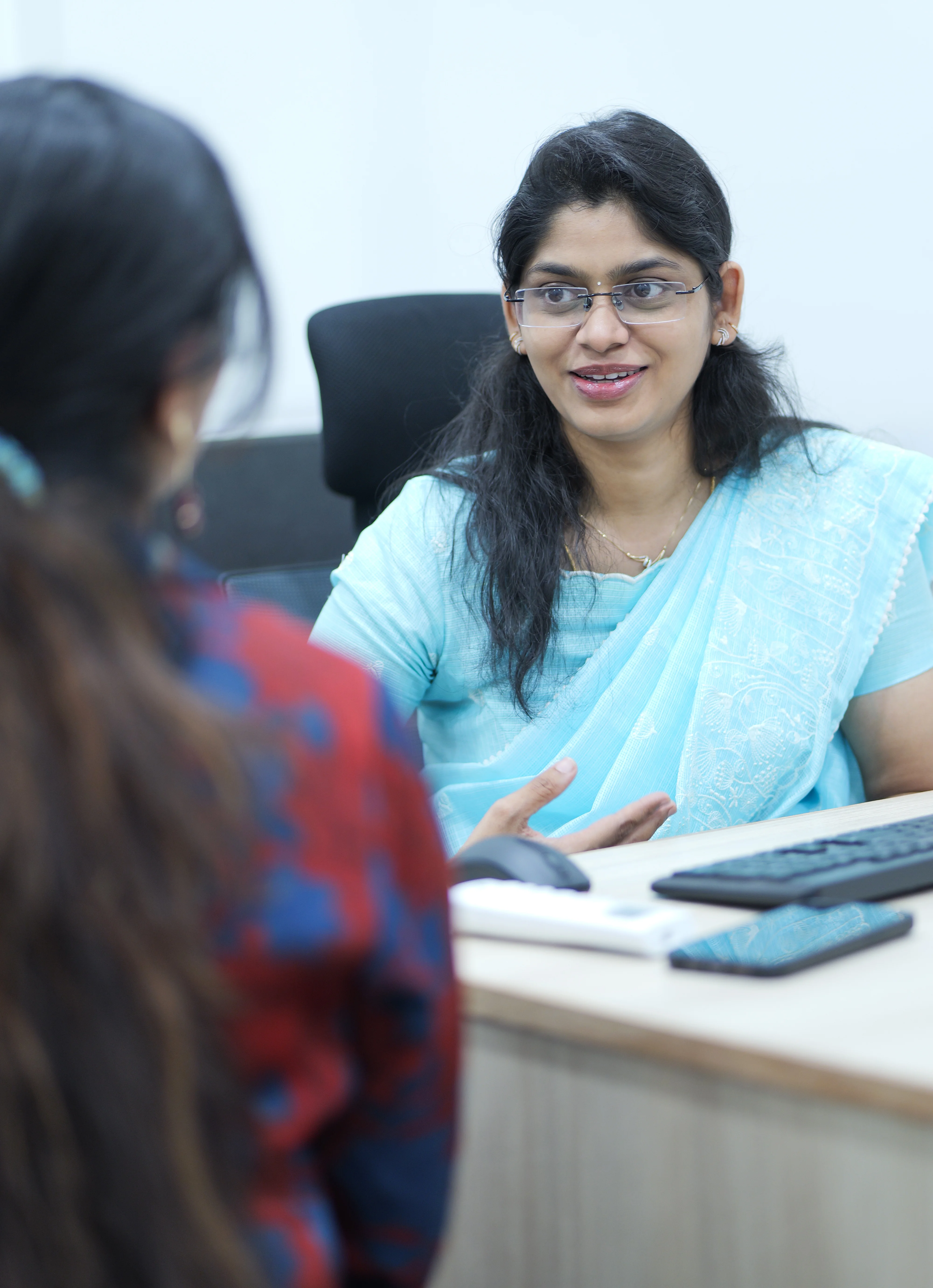 Dermatologist at DermaVue Coimbatore clinic consulting a patient about pre-wedding skin care treatment plan