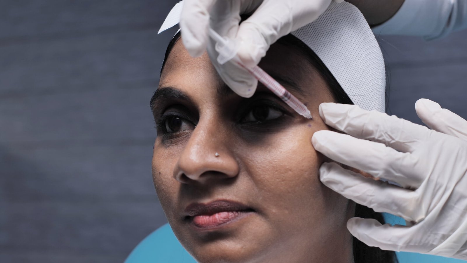 Woman receiving BOTOX treatment at DermaVue clinic